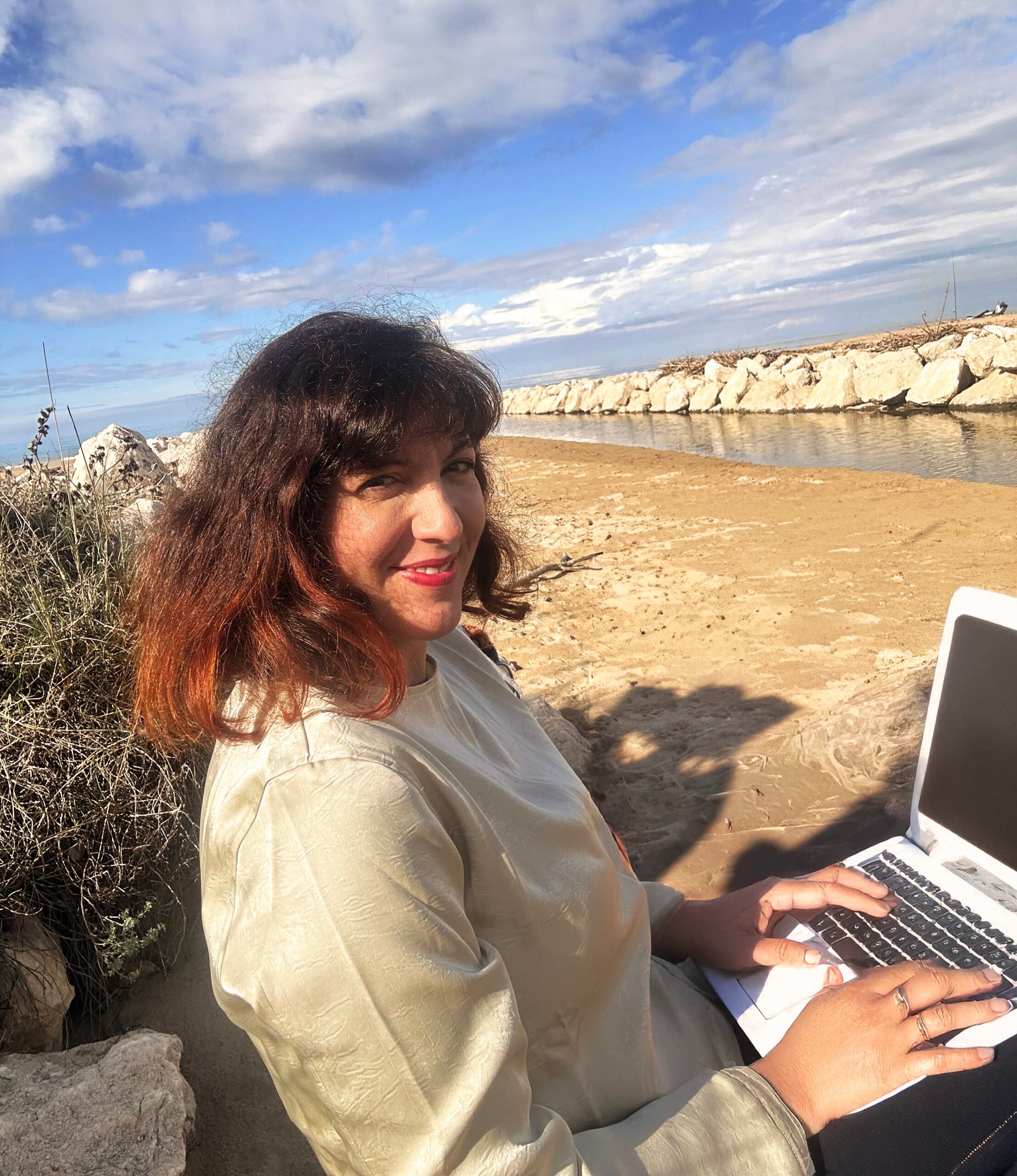 Maria at the beach working